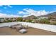 Rooftop terrace offering seating and scenic mountain views at 34083 N Paseo Grande Dr, Queen Creek, AZ 85144