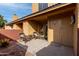 Exterior view of the condo with patio furniture at 3511 E Baseline Rd # 1203, Phoenix, AZ 85042