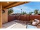 Private patio area with seating and a view of the complex at 3511 E Baseline Rd # 1203, Phoenix, AZ 85042