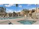 Community pool and spa with lounge chairs and a relaxing atmosphere at 3511 E Baseline Rd # 1203, Phoenix, AZ 85042