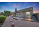 Exterior view of home featuring a stone-covered yard and covered patio at 3727 N Kings Peak N Cir, Mesa, AZ 85215