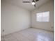 Comfortable bedroom with neutral walls, a ceiling fan, and a bright window at 3727 N Kings Peak N Cir, Mesa, AZ 85215