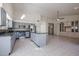 Spacious kitchen featuring granite countertops, stainless steel appliances, and an island at 3727 N Kings Peak N Cir, Mesa, AZ 85215