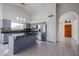 Well-lit kitchen with granite countertops, stainless steel appliances, and a center island at 3727 N Kings Peak N Cir, Mesa, AZ 85215