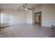 Bright living room featuring tile floors, neutral walls, and direct access to the kitchen at 3727 N Kings Peak N Cir, Mesa, AZ 85215