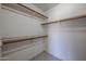 Walk-in closet featuring custom shelving and ample storage space for organization at 3727 N Kings Peak N Cir, Mesa, AZ 85215