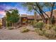 Beautiful desert home with stone accents and landscaping at 39863 N 105Th Pl, Scottsdale, AZ 85262