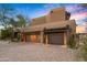 Two-car garage with an attached workshop at 39863 N 105Th Pl, Scottsdale, AZ 85262