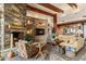 Living room features a stone fireplace and comfortable seating at 39863 N 105Th Pl, Scottsdale, AZ 85262