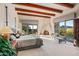 Main bedroom with fireplace and stunning mountain views at 39863 N 105Th Pl, Scottsdale, AZ 85262