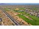 Aerial view of a community with golf course and residential homes at 4119 E Barwick Dr, Cave Creek, AZ 85331