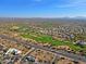 Aerial view showing community near golf course and highway at 4119 E Barwick Dr, Cave Creek, AZ 85331