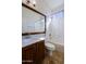 Clean bathroom with a shower/tub combo and wood vanity at 4119 E Barwick Dr, Cave Creek, AZ 85331