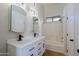 Bathroom with a double vanity, soaking tub and modern lighting at 4119 E Barwick Dr, Cave Creek, AZ 85331