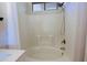 Bathroom with a shower/tub combo and white tile at 4119 E Barwick Dr, Cave Creek, AZ 85331