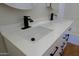 Modern bathroom with double sinks and sleek black faucets at 4119 E Barwick Dr, Cave Creek, AZ 85331