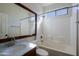 Clean bathroom with marble vanity, shower/tub combo, and large mirror at 4119 E Barwick Dr, Cave Creek, AZ 85331