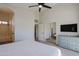 Bright bedroom with mirrored closet doors and en-suite bathroom at 4119 E Barwick Dr, Cave Creek, AZ 85331