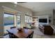 Casual dining area with wood table and view of the backyard pool at 4119 E Barwick Dr, Cave Creek, AZ 85331