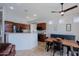 Kitchen dining area with wood table and dark blue buffet at 4119 E Barwick Dr, Cave Creek, AZ 85331