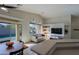 Bright dining area with wood table and view of pool at 4119 E Barwick Dr, Cave Creek, AZ 85331