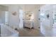 Bright hallway with built-in shelving and access to other rooms at 4119 E Barwick Dr, Cave Creek, AZ 85331