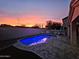 Inviting backyard pool with a large patio and sunset view at 4119 E Barwick Dr, Cave Creek, AZ 85331