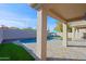 Covered patio overlooking a refreshing kidney-shaped pool at 4119 E Barwick Dr, Cave Creek, AZ 85331