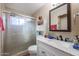 Bathroom with shower, vanity, and storage at 4131 N 55Th Dr, Phoenix, AZ 85031