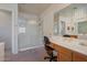 Main bathroom boasts double sinks and a walk-in shower at 43568 W Bedford Dr, Maricopa, AZ 85138