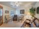 Relaxing living room with comfortable seating and large windows at 43568 W Bedford Dr, Maricopa, AZ 85138