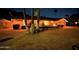 Night view of single story home with festive lights at 437 E Marconi Ave, Phoenix, AZ 85022