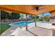 Relaxing pool area with covered patio at 437 E Marconi Ave, Phoenix, AZ 85022