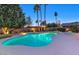 Stunning pool and spa at night, beautifully illuminated at 437 E Marconi Ave, Phoenix, AZ 85022