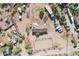 High-angle view showcasing a single-story home, pool, and surrounding desert landscape at 47435 N Meander Rd, New River, AZ 85087