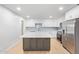 Updated kitchen featuring an island and white cabinets at 501 W Linda Ln, Chandler, AZ 85225