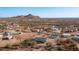 Aerial view showcasing the home and surrounding desert landscape at 5089 E 26Th Ave, Apache Junction, AZ 85119