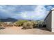 House exterior with walkway and mountain views at 5089 E 26Th Ave, Apache Junction, AZ 85119