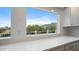 Kitchen with white cabinets and expansive window showcasing mountain views at 5089 E 26Th Ave, Apache Junction, AZ 85119