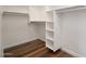 Large walk-in closet with double hanging rods and shelving at 5089 E 26Th Ave, Apache Junction, AZ 85119