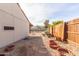 Landscaped backyard with gravel and brick pathway at 5519 W Elgin St, Chandler, AZ 85226