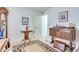 Cozy bedroom with antique furniture and a geometric rug at 5519 W Elgin St, Chandler, AZ 85226