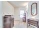 Bright entryway with wood furniture and tiled floor at 5519 W Elgin St, Chandler, AZ 85226