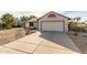 One-story house with a two-car garage and landscaped front yard at 5519 W Elgin St, Chandler, AZ 85226