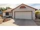 One-story house with a two-car garage and landscaped front yard at 5519 W Elgin St, Chandler, AZ 85226