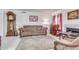 Living room with fireplace, wood furniture, and a large rug at 5519 W Elgin St, Chandler, AZ 85226