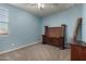 Spacious bedroom with carpeted floor and ceiling fan at 5656 N 109Th Ave, Phoenix, AZ 85037