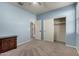 Bright bedroom featuring a large closet and neutral walls at 5656 N 109Th Ave, Phoenix, AZ 85037