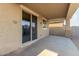 Covered patio with sliding glass doors and concrete flooring at 5656 N 109Th Ave, Phoenix, AZ 85037