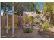 Charming backyard with a swing set and landscaped areas at 5777 N 78Th Pl, Scottsdale, AZ 85250